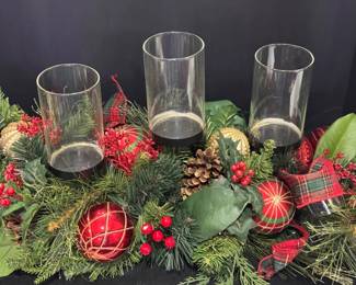 Christmas candle and greenery centerpiece