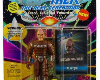 550 - Playmates Star Trek TNG Vorgon Figure Sealed (Description): Unopened Playmates Star Trek The Next Generation action figure in original box featuring the Vorgon character. The figure remains factory sealed in its packaging.