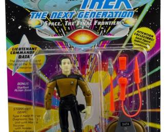 526 - Playmates Star Trek TNG Lt. Commander Data (Description): Unopened Playmates Star Trek The Next Generation action figure in original box featuring Lieutenant Commander Data. The figure remains factory sealed in its packaging.