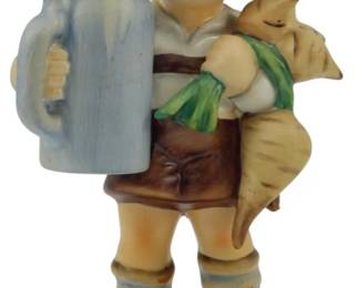 565 - Hummel For Father Figure 5.5" (Description): Hummel "For Father" figurine depicting a young Bavarian boy in traditional lederhosen and alpine hat, holding a blue-gray beer stein in one hand and a large turnip in the other. The charming figure features hand-painted details including rosy cheek, striped knee socks, and a green neckerchief. Measures 5.5 inches tall.