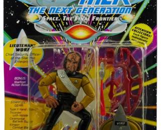 530 - Playmates Star Trek TNG Lt. Worf Figure (Description): Unopened Playmates Star Trek The Next Generation action figure in original packaging featuring Lieutenant Worf, Chief Security Officer of the Starship Enterprise. The figure remains sealed in its original box.