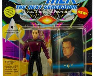 533 - Playmates Star Trek TNG Q Figure Unopened (Description): Unopened Playmates Star Trek: The Next Generation action figure featuring the character Q. The figure remains sealed in its original packaging.