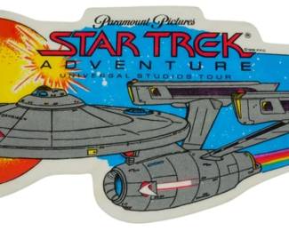 513 - 1988 Star Trek Adventure Universal Studios (Description): 1988 Star Trek Adventure Universal Studios Tour flag featuring the USS Enterprise. Measures 9 inches by 21 inches.