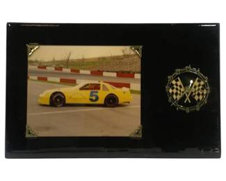 5991 - Vintage #5 Hatchet Racing Clock - 19 x 12 (Description): Used as is electric/electronic/mechanical item. No guarantee all components, untested.