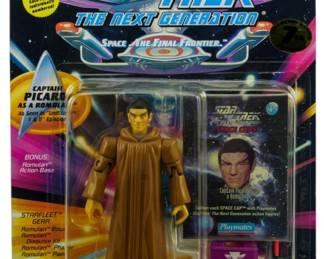531 - Playmates Star Trek TNG Picard as Romulan (Description): Unopened Playmates Star Trek The Next Generation figure in original box featuring Captain Picard as a Romulan. The figure remains sealed in its original packaging.