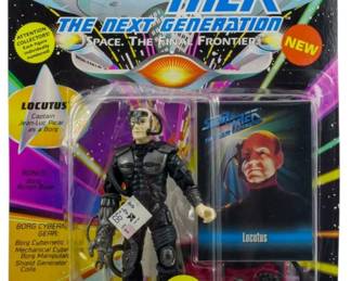 553 - Playmates Star Trek TNG Locutus Figure NIB (Description): Unopened Playmates Star Trek: The Next Generation action figure in original box featuring Locutus, Captain Jean-Luc Picard as a Borg. The figure remains sealed in its original packaging with exclusive Skybox Playmates collector card included.