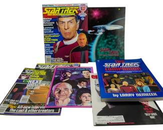 519 - Assorted Vtg Star Trek Magazines & Books (Description): Assorted vintage Star Trek magazines and books. The collection includes various publications related to Star Trek: The Next Generation, featuring magazine issues and companion books from the popular science fiction franchise.