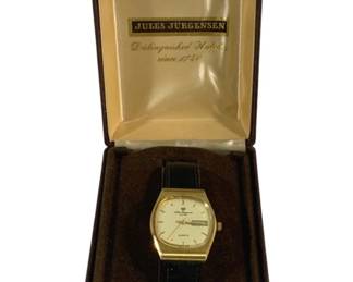 4155 - Jules Jurgensen Watch in Case (Description): Used as is electric/electronic/mechanical item. No guarantee all components, untested.