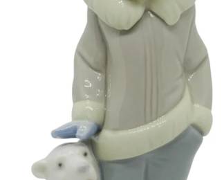 631 - Lladro 5238 Eskimo Boy with Polar Bear Cub (Description): 6" Tall