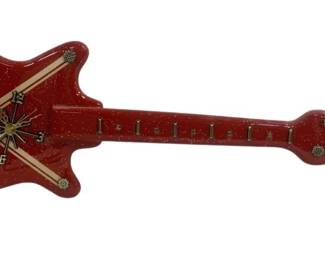 5999 - Elvis Guitar Clock - 39 x 11 (Description): Used as is electric/electronic/mechanical item. No guarantee all components, untested.