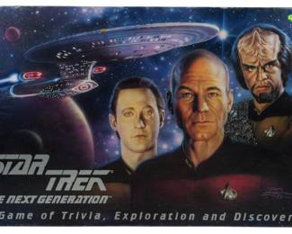 502 - 1993 Star Trek Next Generation Trivia Game (Description): 1993 Star Trek The Next Generation A Game of Trivia Exploration & Discovery. This board game offers fans of the iconic science fiction series an interactive experience combining trivia questions with elements of exploration and discovery.