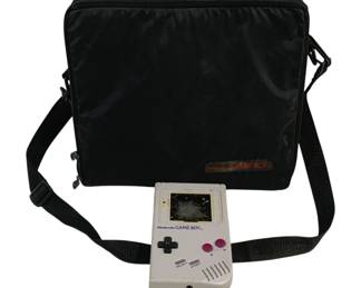5699 - Nintendo Gameboy w/ Nintendo Bag (Description): Used as is electric/electronic/mechanical item. No guarantee all components, untested.