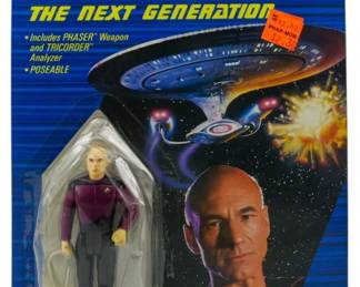 554 - Galoob Star Trek TNG Captain Picard Figure (Description): Unopened Galoob Star Trek The Next Generation action figure in original box featuring Captain Jean Luc Picard, Captain of the U.S.S. Enterprise Starship. The figure is poseable and includes phaser weapon and tricorder analyzer accessories.