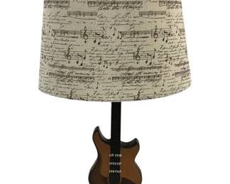 4556 - Guitar Lamp - 25" Tall (Description): Used as is electric/electronic/mechanical item. No guarantee all components, untested.