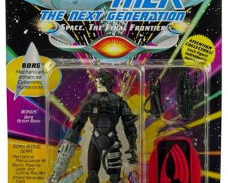 542 - Playmates Star Trek TNG Borg Figure Unopened (Description): Unopened Playmates Star Trek The Next Generation action figure in original packaging featuring the Borg, the mechanically enhanced cybernetic humanoids from the series. The figure comes complete with Borg bionic gear accessories and bonus Borg action