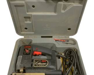 5017 - Skil Classic Model Saw w/ Case - 14 x 12 x 4 (Description): Used as-is electric/electronic/mechanical item - no guarantee all components, untested.