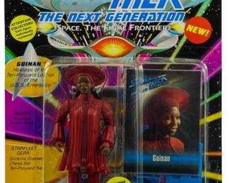 540 - Playmates Star Trek TNG Guinan Figure (Description): Unopened Playmates Star Trek The Next Generation action figure in original box featuring Guinan, the hostess of the Ten-Forward Lounge on the U.S.S. Enterprise. The figure comes with bonus Starfleet action base, Starfleet gear including drinking glas