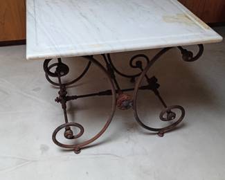 Marble top on iron base