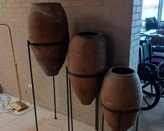 Same three large earthenware jars