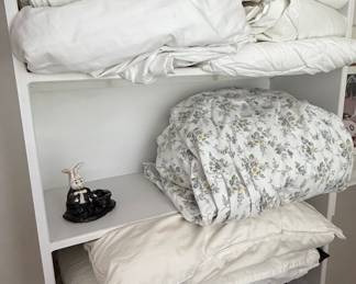 White Cotton Bedding Set with Floral Quilt and Decorative Bunny Figurine