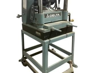 560 - Delta Model RC-33 13" Planer on Base (Description): 42 x 31 x 30 Used as is electric/electronic/mechanical item. No guarantee all components, untested.