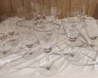 196 - 17 Assorted Silver Rimmed Glass Stems