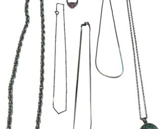 1007 - 5 Silver Toned Necklaces and 2 Rings (Description): Necklaces lengths range from 15 to 36 inches. The ring with the pink stone is a size 6 and the orange ring is a size 7.