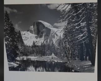 Half Dome, Yosemite Valley, Winter," captured by the legendary photographer Ansel Adams around 1938.
