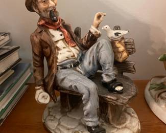 Vintage Capodimonte Ceramic Figurine of a Man with Pipe and Bird
