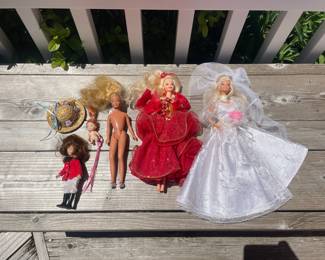 Assorted Vintage Barbie Dolls and Accessories