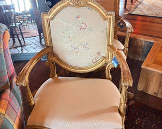 French-style open armchairs