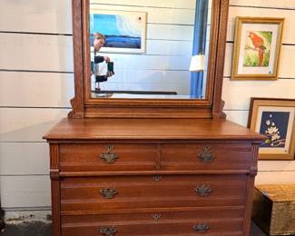 Eastlake style oak dresser with an attached wishbone-style mirror