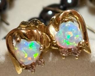 High Quality 14k and fire opal with diamond accents 