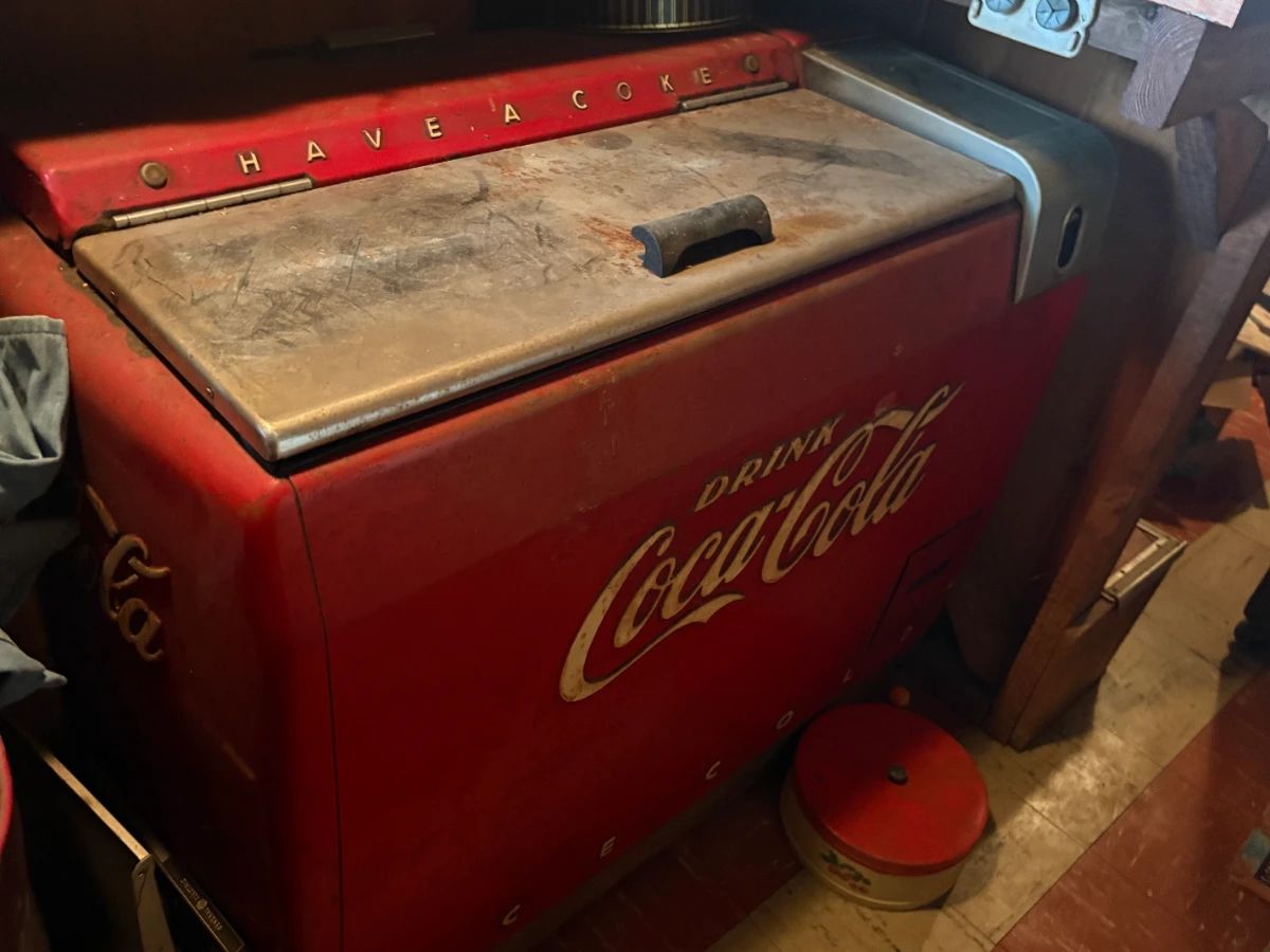 . . . large Coca-Cola fridge. . .
