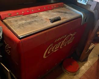 . . . large Coca-Cola fridge. . .