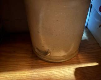. . . this stoneware crock has a cobalt floral mark -- 6 gallon