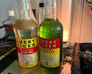 . . . and Lucky Tiger hair tonic