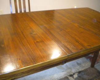Dining table with leaf exposed