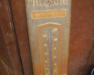 Old Firestone metal thermometer