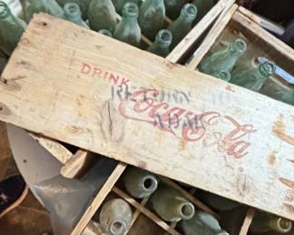 Vintage CocaCola Soda Bottles in Wooden Crate