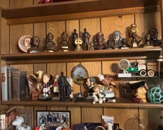Collection of Collectibles including Toy Cars, Busts, and Figurines
