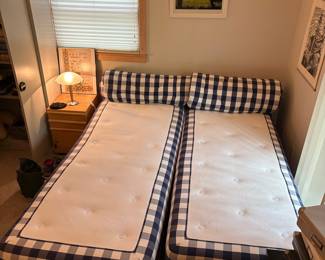 Hästens Blue and White Gingham Upholstered Twin Beds with Bolster Pillows