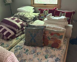 Vintage Floral Pattern Twin Mattresses with Assorted Pillows and Bedding