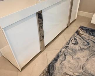 Modern White HighGloss Sideboard with Chrome Accents and Marble Inlay Doors