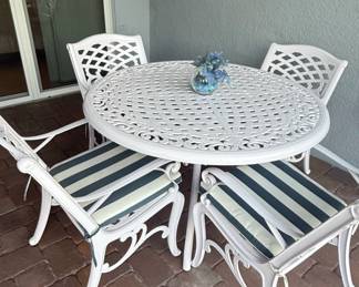 White Cast Aluminum Lattice Patio Dining Set with Chairs and Striped Cushions