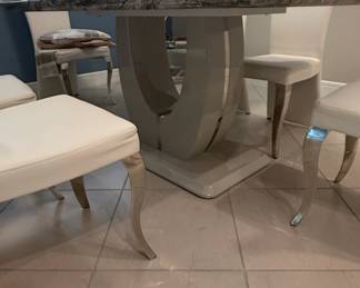Modern Faux Marble Dining Table Set with UShaped Base and White Upholstered Chairs
