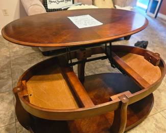 And the coffee table opens to a eating platform and storage facility