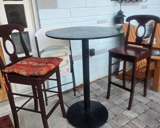 This metal based wood top and too tall wooden bar stool bistro set is located at my house in Melbourne. $75 please do not come here looking for this set