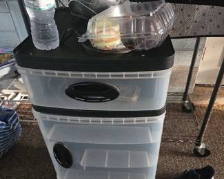 Towering three compartment rolling storage device $20 I believe this is where she stored her massage tools