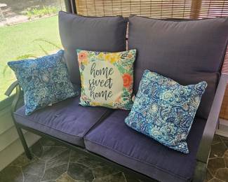 The love seat that goes with the four-piece set I'll even throw in the pillows if you do not haggle on the great price